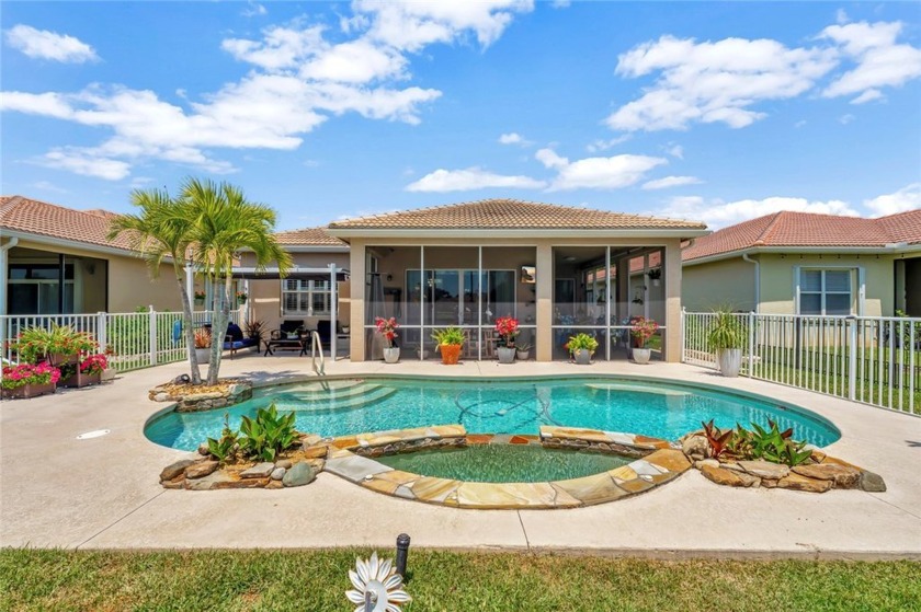 Stunning lakefront 3BR/2BA pool home with saltwater heated pool - Beach Home for sale in Vero Beach, Florida on Beachhouse.com