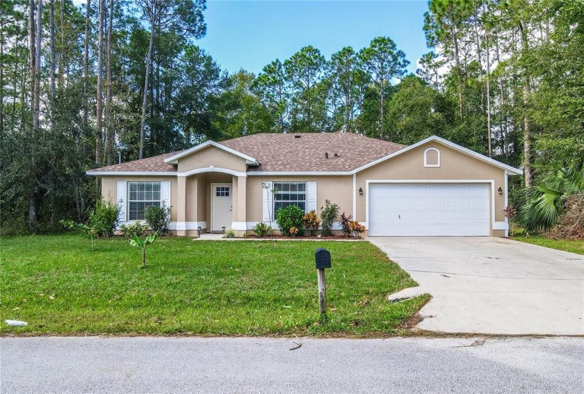 Don't miss this immaculate home located on a private lot and - Beach Home for sale in Palm Coast, Florida on Beachhouse.com
