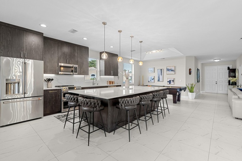 Discover this exceptionally updated single family home situated - Beach Home for sale in Boynton Beach, Florida on Beachhouse.com