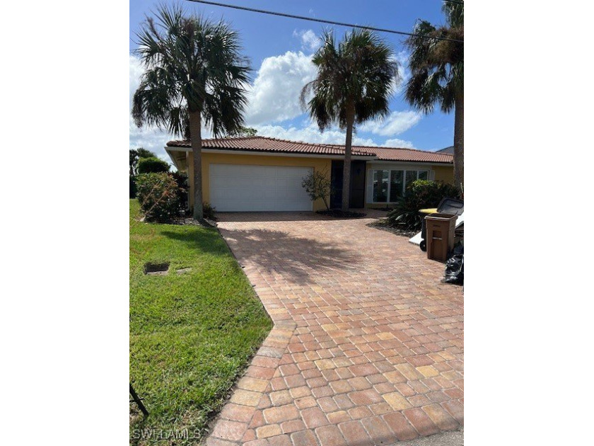 Welcome to 2261 Bayview Drive, a prime canal-front property in - Beach Home for sale in Punta Gorda, Florida on Beachhouse.com