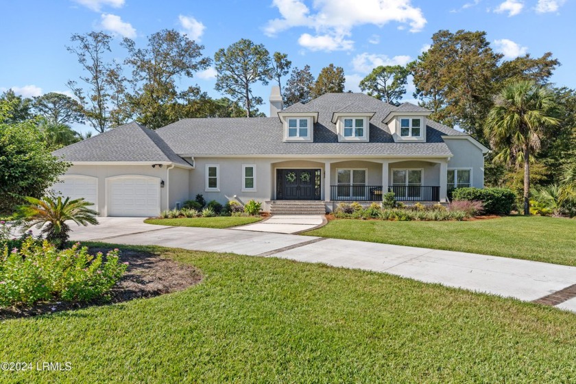 This beautifully remodeled 4BR/3.5BA home w/a 2-car garage is - Beach Home for sale in Hilton Head Island, South Carolina on Beachhouse.com