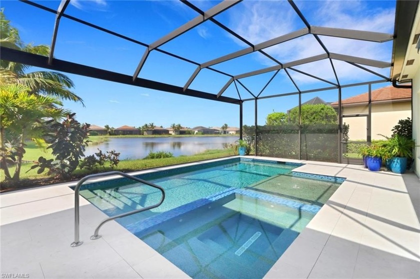 Enjoy glittering lake views from this generously appointed GL - Beach Home for sale in Bonita Springs, Florida on Beachhouse.com