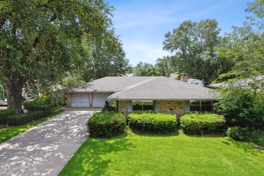 BEAUTIFUL HOME ON LARGE WELL LANDSCAPED LOT ON PRIVATE - Beach Home for sale in Diamondhead, Mississippi on Beachhouse.com