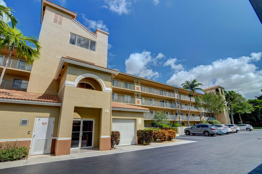 Enjoy picturesque views of the lake from this lovely 3 bedroom - Beach Condo for sale in Boynton Beach, Florida on Beachhouse.com