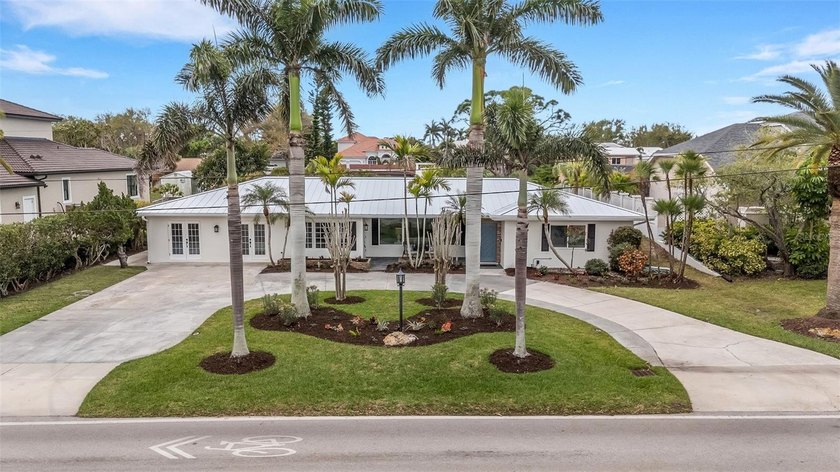Welcome to 441 Bayshore Drive, an exceptional coastal retreat on - Beach Home for sale in Venice, Florida on Beachhouse.com