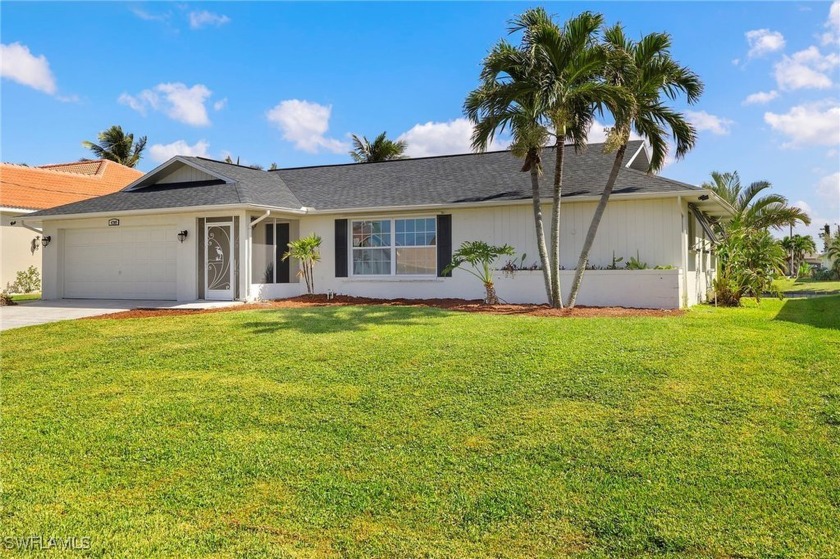 Located in the HEART of SW Cape Coral, this CHARMING 3 bedroom 2 - Beach Home for sale in Cape Coral, Florida on Beachhouse.com