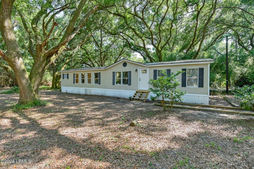 Come make this 3Br 2Ba home your own. Just a short walk to - Beach Home for sale in Saint Helena Island, South Carolina on Beachhouse.com