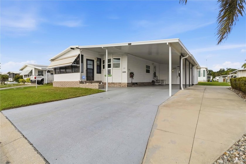 Home Sweet Home! This furnished 2-bedroom, 2-bath LAND-OWNED gem - Beach Home for sale in Ellenton, Florida on Beachhouse.com