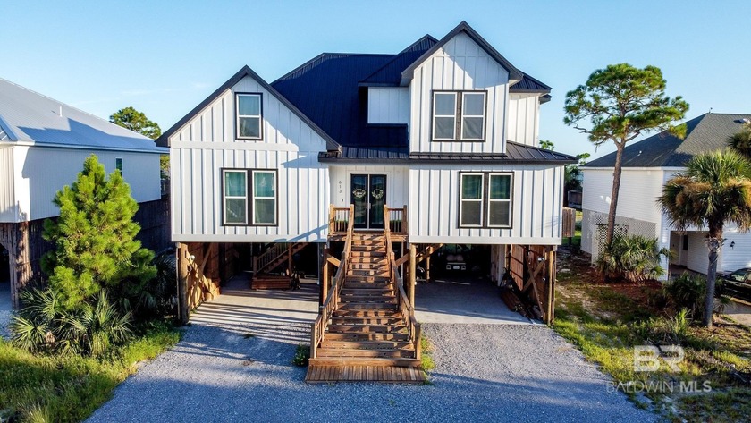 With its distinctive design, thoughtful features, and modern - Beach Home for sale in Dauphin Island, Alabama on Beachhouse.com