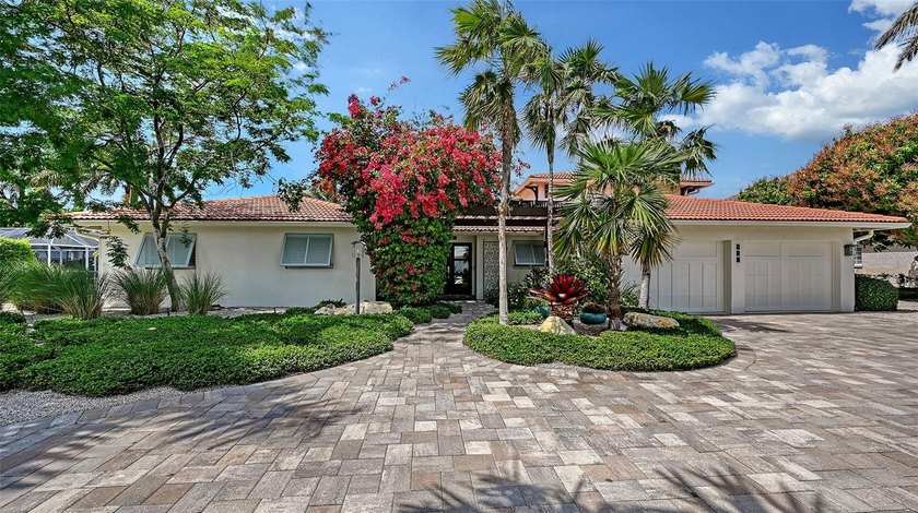 A seamless blend of refined design and waterfront living defines - Beach Home for sale in Longboat Key, Florida on Beachhouse.com