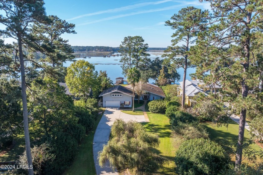 Sitting on the bluffs of the Okatie River, check out the highly - Beach Home for sale in Bluffton, South Carolina on Beachhouse.com