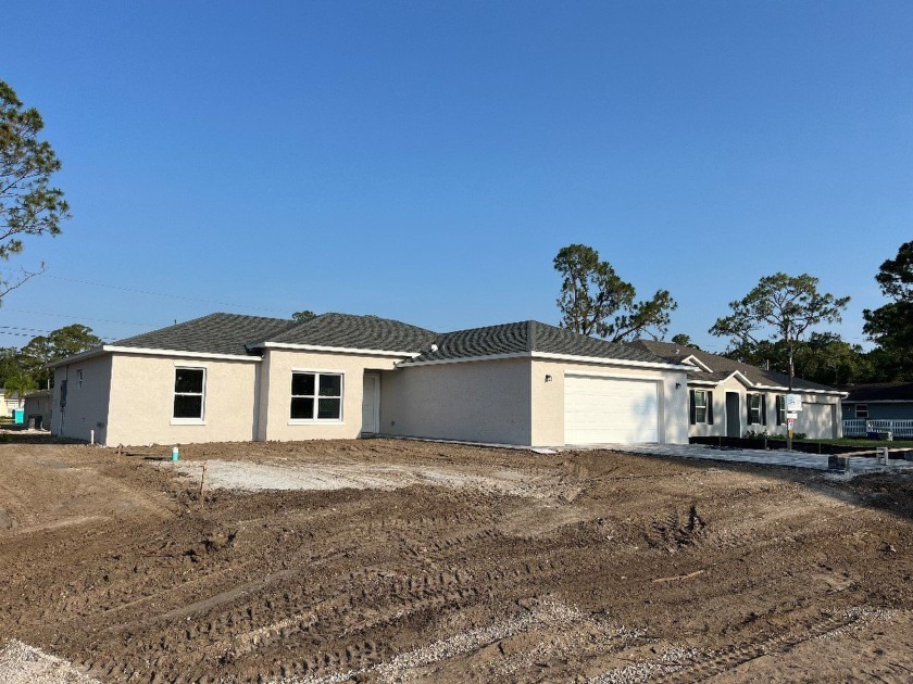 BEAUTIFUL CUSTOM HOME BY RIVERVIEW CONSTRUCTION!! OPEN FLOOR - Beach Home for sale in Vero Beach, Florida on Beachhouse.com