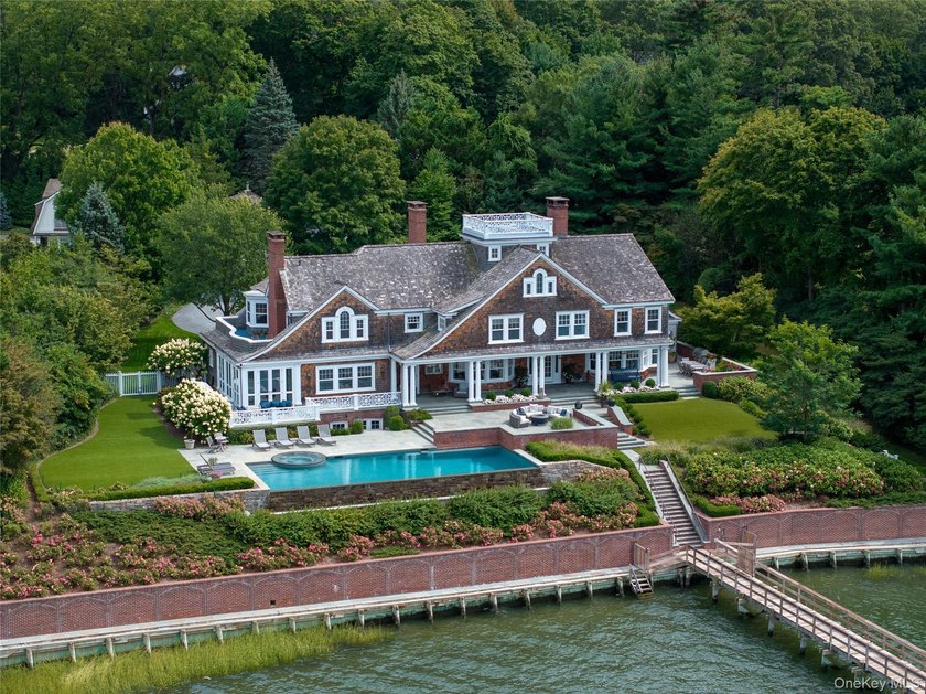 Direct Waterfront Estate with 300+ Ft Deep-Water Dock. Built in - Beach Home for sale in Cove Neck, New York on Beachhouse.com