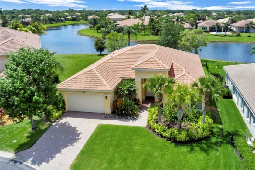 Exquisite lakefront 3BR + Den/4th BR, 2.5BA home on a premium - Beach Home for sale in Vero Beach, Florida on Beachhouse.com