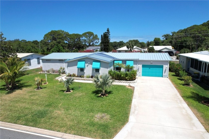 Stunning Quadruple Wide Home on Double Lot with Oversized - Beach Home for sale in Barefoot Bay, Florida on Beachhouse.com