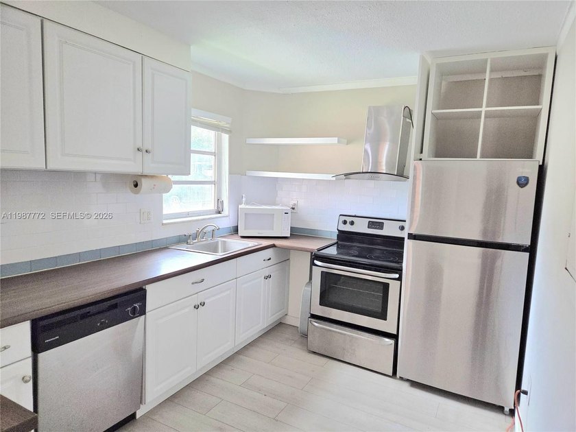 Enjoy beautiful pond views from your private screened porch! - Beach Condo for sale in Miami, Florida on Beachhouse.com