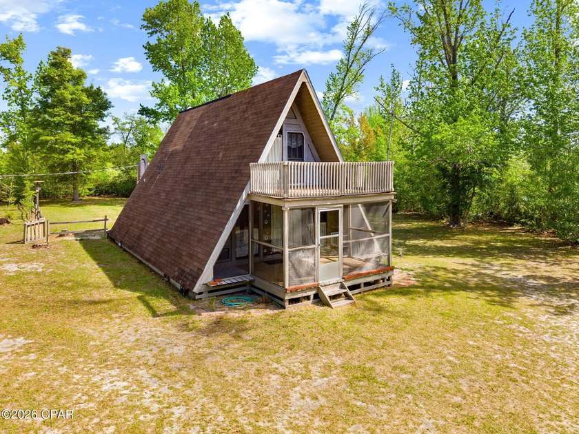 Tucked away on 2.7 acres along the beautiful shores of Gainer - Beach Home for sale in Southport, Florida on Beachhouse.com