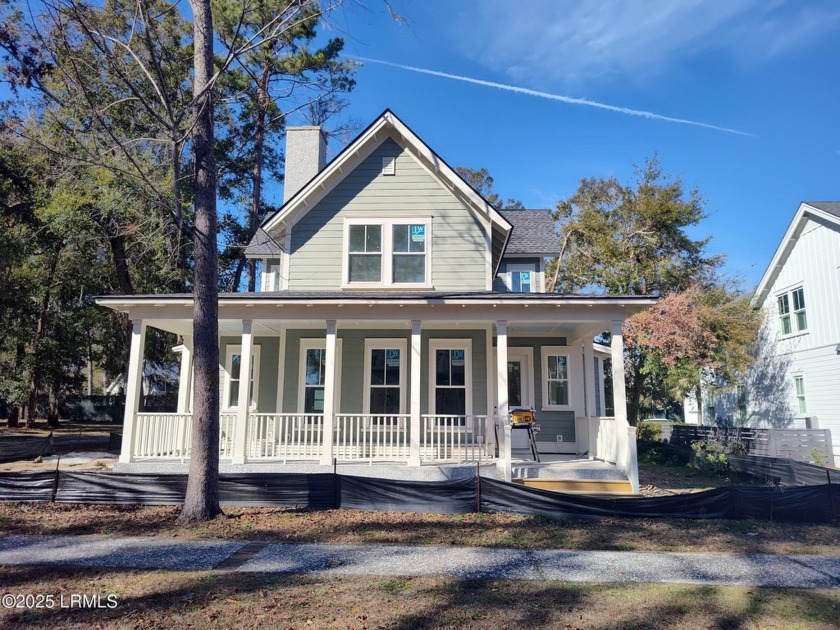 Nestled among towering oak trees draped in Spanish moss, this - Beach Home for sale in Beaufort, South Carolina on Beachhouse.com