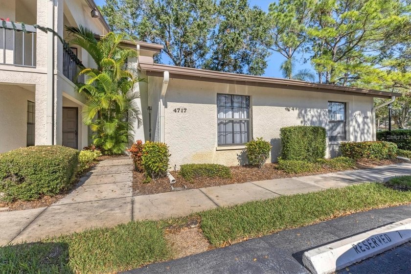 Tucked inside the lush, park-like setting of The Meadows, this - Beach Condo for sale in Sarasota, Florida on Beachhouse.com