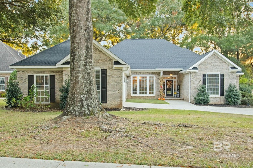 Welcome to this elegant 4-bedroom, 3-bath home located in the - Beach Home for sale in Spanish Fort, Alabama on Beachhouse.com