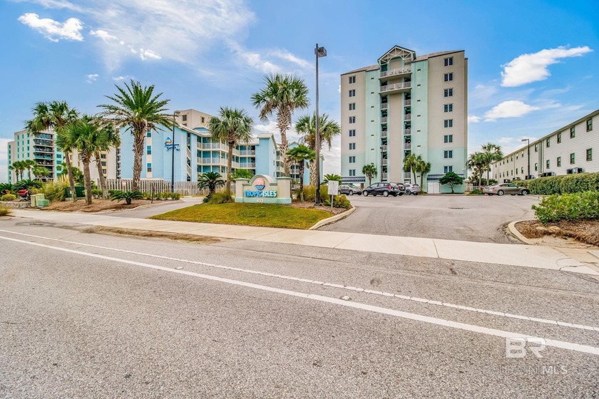 Welcome to your fully renovated top-floor retreat, just steps - Beach Condo for sale in Gulf Shores, Alabama on Beachhouse.com