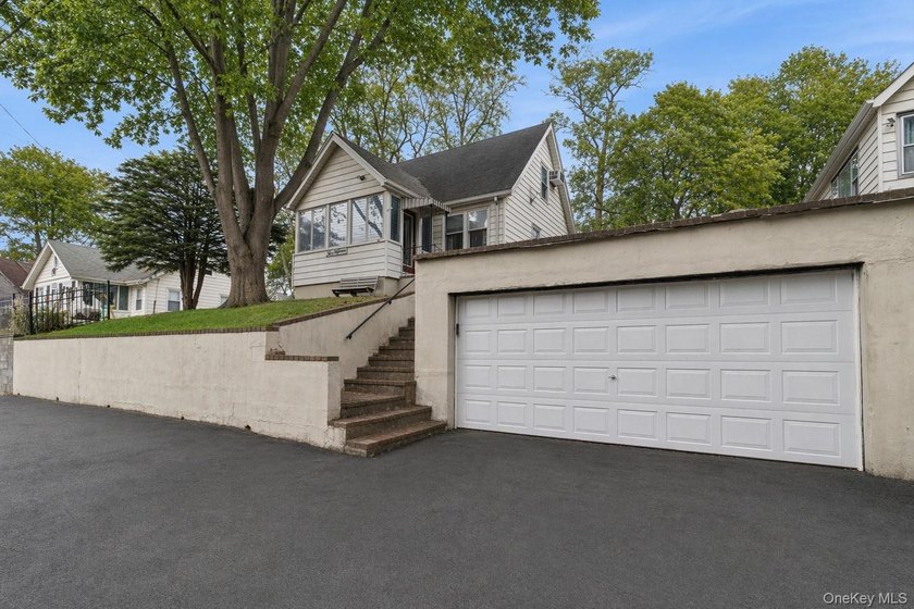 Wake up to breathtaking year-round water views of the Long - Beach Home for sale in Rocky Point, New York on Beachhouse.com
