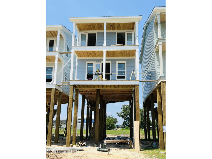 This under-construction property on Hwy 90 offers an open - Beach Home for sale in Gulfport, Mississippi on Beachhouse.com