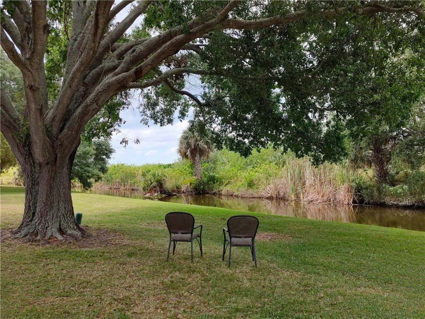 Location, location! Offering one- owner home with a  charming - Beach Home for sale in Barefoot Bay, Florida on Beachhouse.com