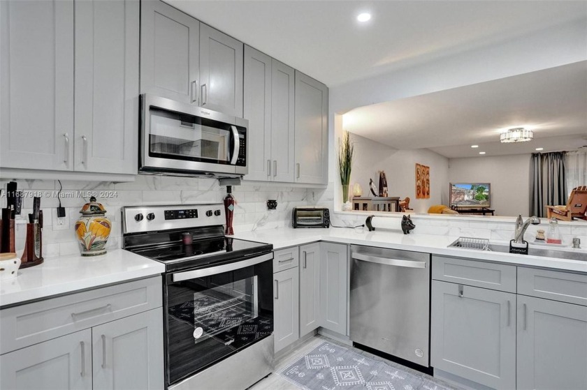 Remarkable + renovated townhouse condo nestled in the heart of - Beach Condo for sale in Pompano Beach, Florida on Beachhouse.com