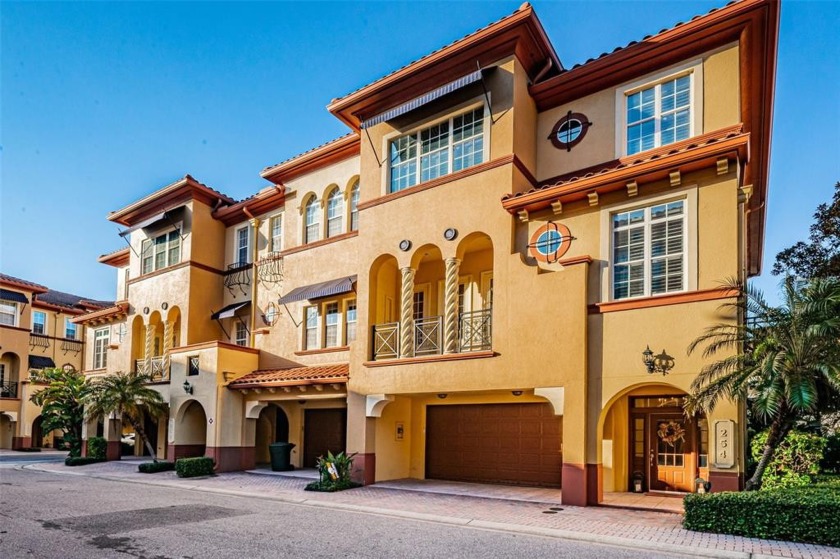 Imagine if you will, pulling up to the gates of your exclusive - Beach Townhome/Townhouse for sale in Dunedin, Florida on Beachhouse.com