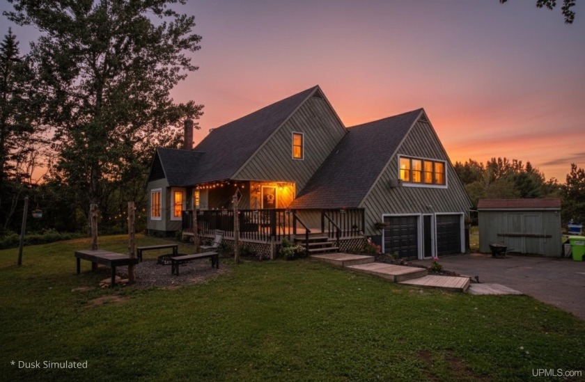 Set on four wooded acres in Stanton Township, this chalet-style - Beach Home for sale in Atlantic Mine, Michigan on Beachhouse.com