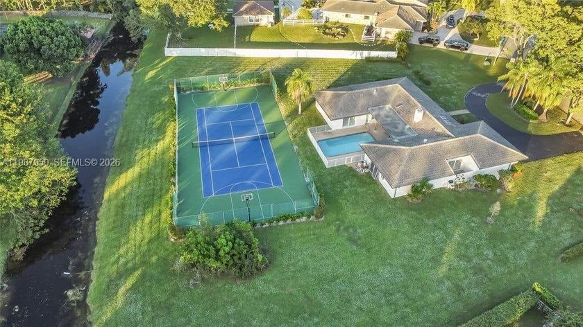Welcome to this fully renovated, move-in ready estate situated - Beach Home for sale in Coral Springs, Florida on Beachhouse.com