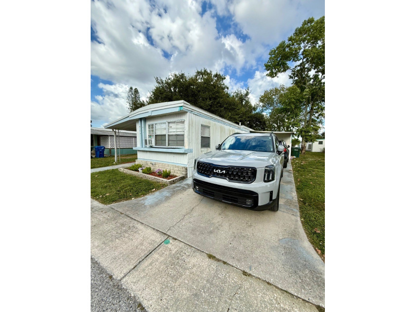 LOOK!! ALL AGE FAMILY COMMUNITY. 2 BRMS AND 2 FULL BATHROOMS - Beach Home for sale in Largo, Florida on Beachhouse.com