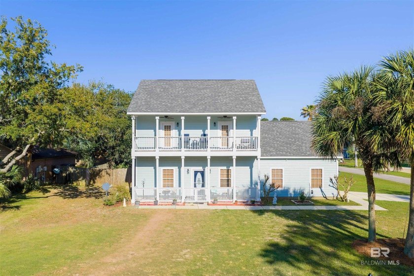 Wake up to glimpses of Little Lagoon and spend your evenings - Beach Home for sale in Gulf Shores, Alabama on Beachhouse.com