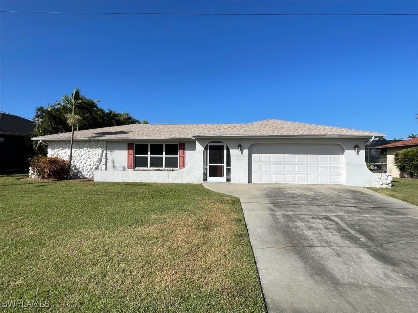 Located on a breathtaking intersecting gulf access canal in SE - Beach Home for sale in Cape Coral, Florida on Beachhouse.com