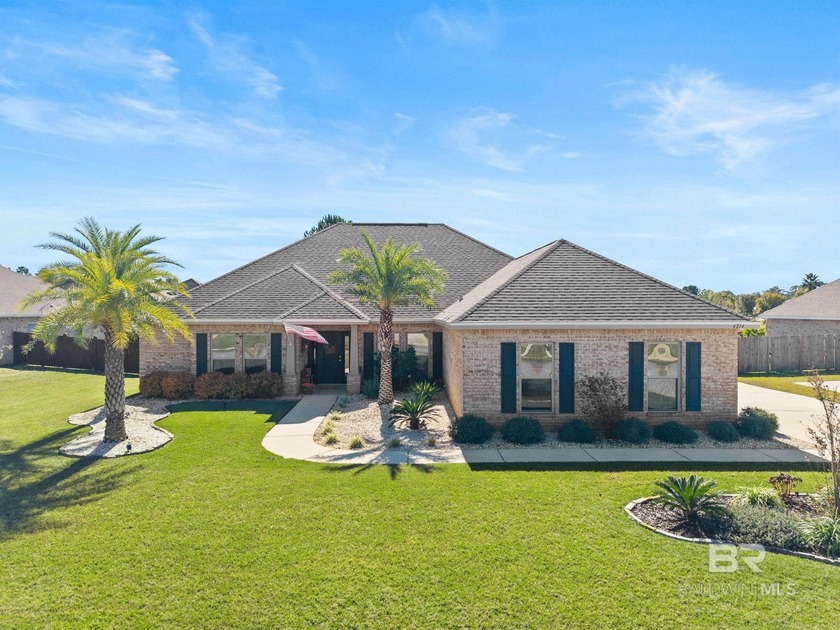 Elegant Brick Ranch with Resort-Style Backyard Oasis. Welcome to - Beach Home for sale in Gulf Shores, Alabama on Beachhouse.com