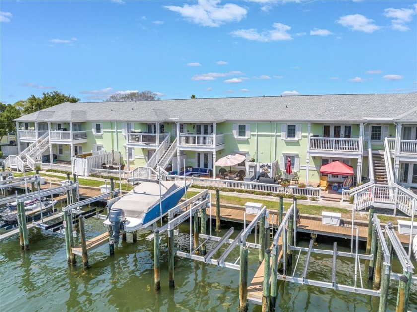 Boat slip is a 7,000 lb lift and comes with remote. Buyer must - Beach Condo for sale in St. Petersburg, Florida on Beachhouse.com