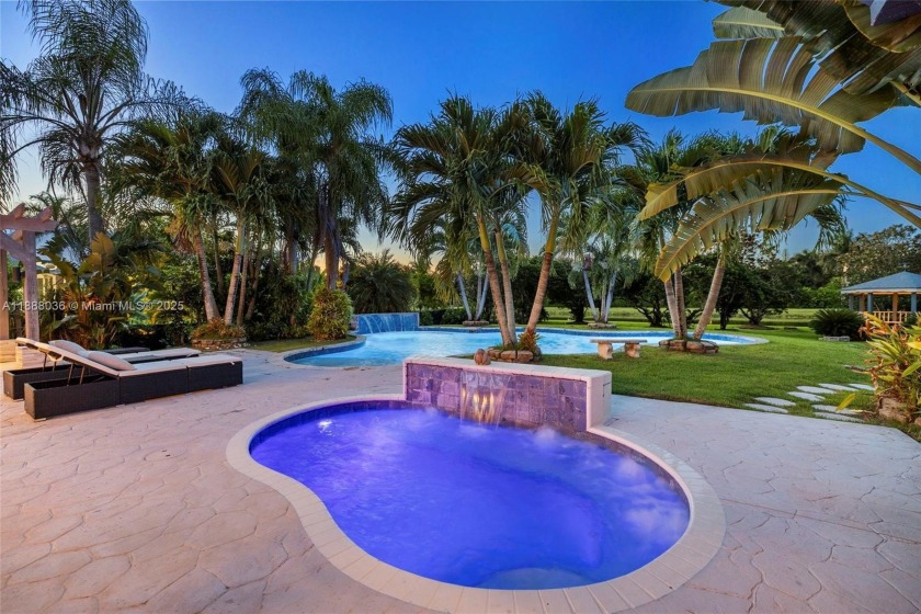Discover refined living on a full acre in Kapok Village Estates - Beach Home for sale in Davie, Florida on Beachhouse.com