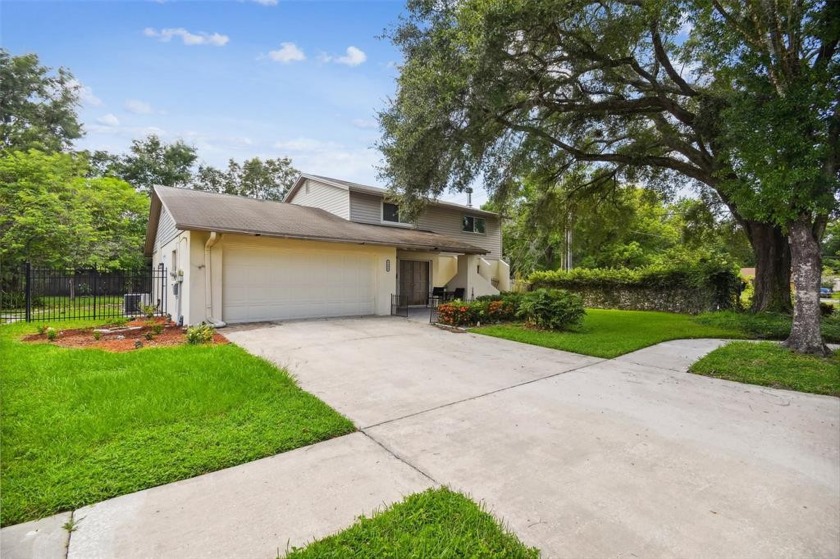 Welcome to this charming 2 story, 4 Bedroom/ 2 1/2 Bath, POOL - Beach Home for sale in Tampa, Florida on Beachhouse.com