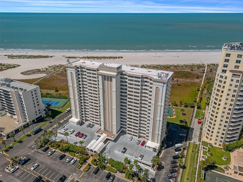 OWN A SLICE OF BEACHFRONT PARADISE!  Wake up to Gulf breezes and - Beach Condo for sale in Clearwater Beach, Florida on Beachhouse.com
