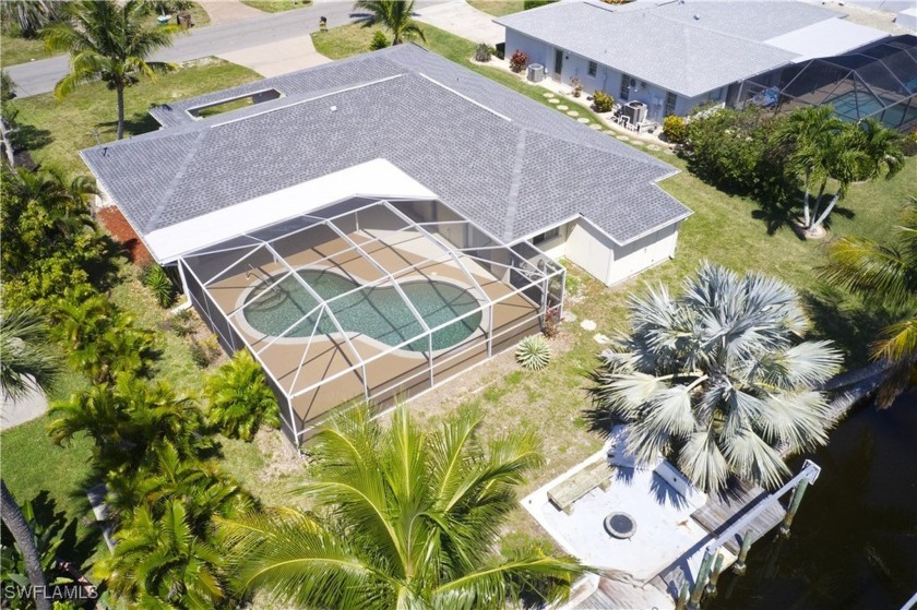 Come and embrace waterfront living at its finest! Just bring - Beach Home for sale in Cape Coral, Florida on Beachhouse.com