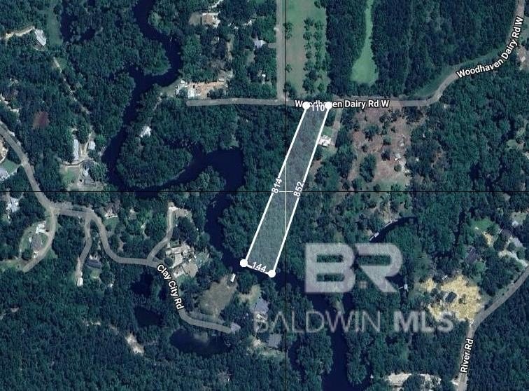 Have you been looking for deep water frontage on Fish River - Beach Acreage for sale in Silverhill, Alabama on Beachhouse.com
