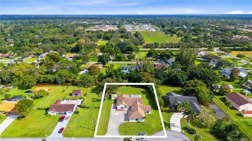 Nestled in a peaceful area of West Davie, this versatile 5 bed 3 - Beach Home for sale in Davie, Florida on Beachhouse.com