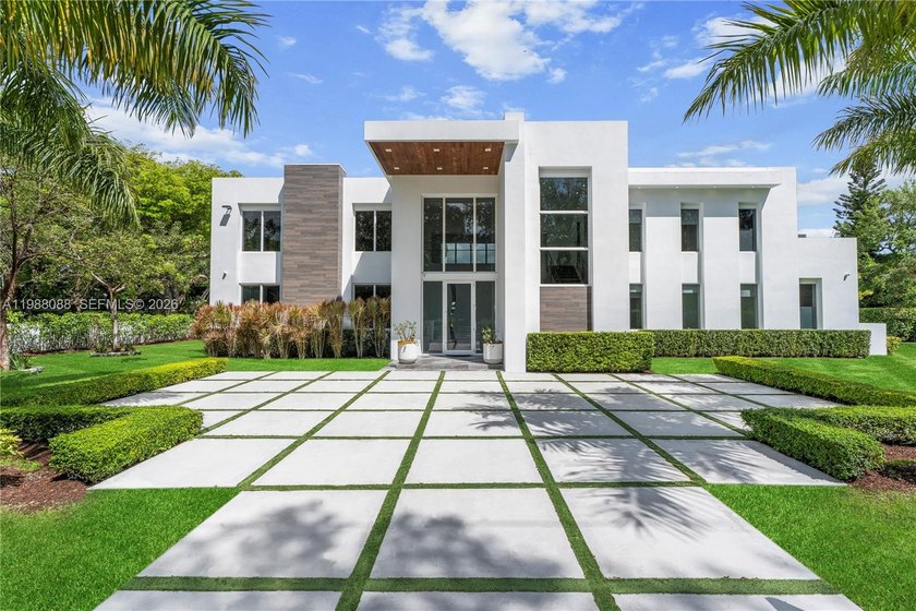 An exceptional gated Pinecrest estate on a corner lot spanning - Beach Home for sale in Pinecrest, Florida on Beachhouse.com