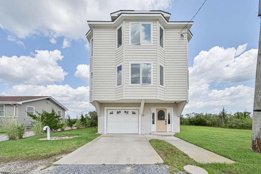 Enjoy tranquility and stunning bay views from your two decks in - Beach Home for sale in Egg Harbor Township, New Jersey on Beachhouse.com