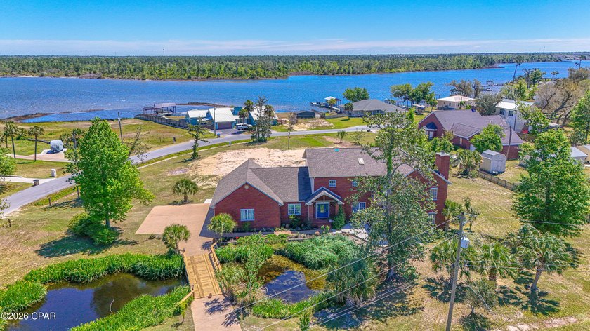 Welcome to a rare offering where refined craftsmanship meets the - Beach Home for sale in Lynn Haven, Florida on Beachhouse.com