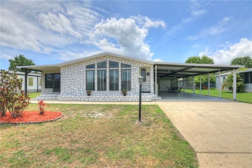 New Roof 2024. Located in the sought-after Haven Green section - Beach Home for sale in Barefoot Bay, Florida on Beachhouse.com