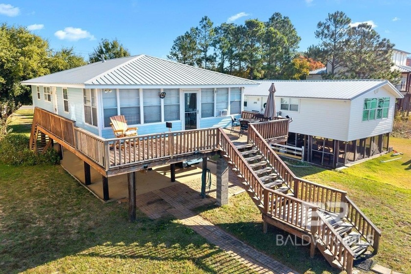 Charming 3 bedroom raised cottage on Mobile Bay. This retreat is - Beach Home for sale in Fairhope, Alabama on Beachhouse.com