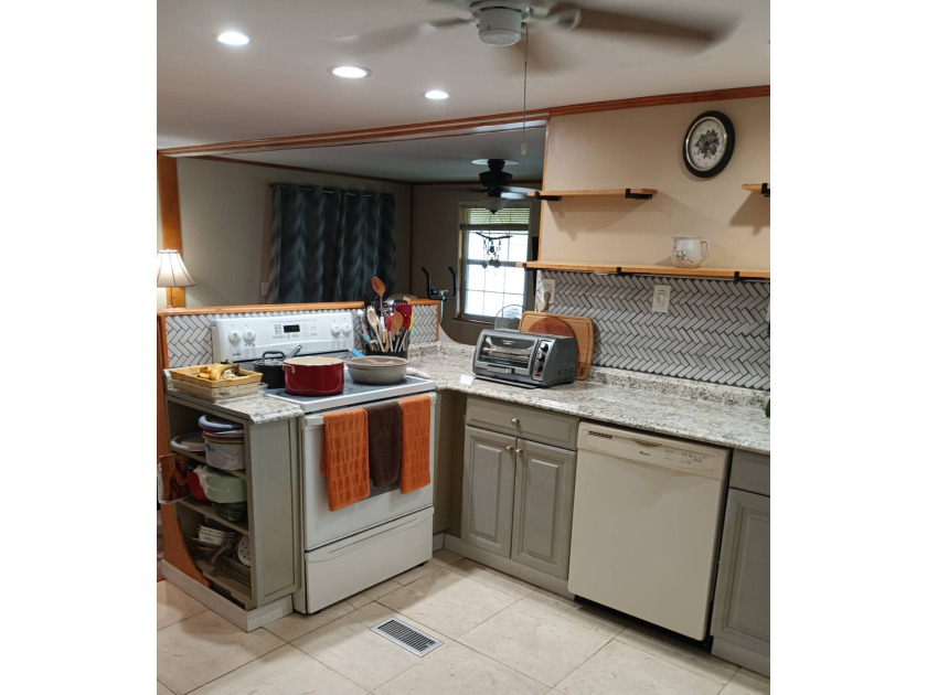 1970 12x56 with 10x17 expando unit located at Eldorado Village - Beach Home for sale in Largo, Florida on Beachhouse.com