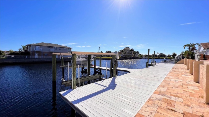 This stunning 5 bedroom, 3 full bath, oversized true 3 car - Beach Home for sale in New Port Richey, Florida on Beachhouse.com